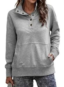 Detail view of women's grey casual long-sleeved sweatshirt with button neck and pocket