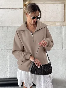 Elegante felpa oversize in pile da donna con mezza zip e tasca frontale in colore kaki
