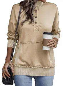 Casual khaki sweatshirt featuring a buttoned mock neck and distinctive raw-edge front pocket