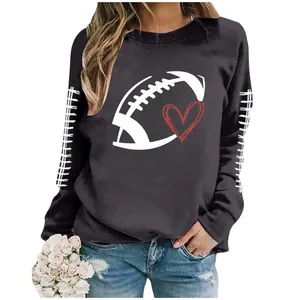 Close-up of women's long sleeve sweatshirt with football and heart graphic print