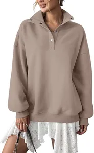 Detail of oversized tan Henley sweatshirt with button lapel and soft fleece lining