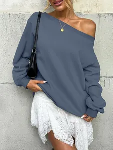 Casual blue off-the-shoulder sweatshirt paired with an elegant white lace skirt.