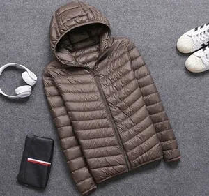 Detailed view of a lightweight brown hooded padded jacket featuring a quilted pattern