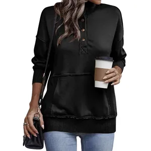 Stylish solid black women's sweatshirt featuring buttoned collar and front pocket design.