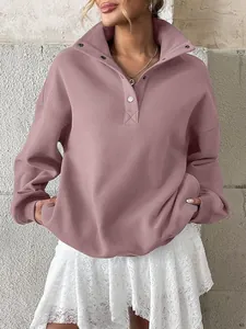 Oversized mauve Henley sweatshirt with button-up collar and long sleeves detail
