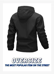 Detailed back view of black hooded oversize outdoor jacket for men in street style
