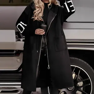 Women's elegant long hooded windbreaker coat with patchwork knit sleeves in black.