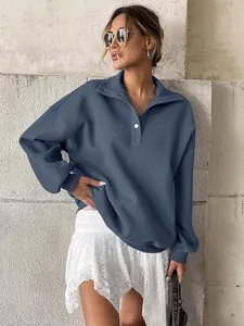 Stylish oversized women's Henley collar sweatshirt in blue with buttons and lace skirt