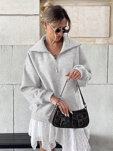 Felpa da donna in pile grigio con mezza cerniera e maniche lunghe in stile casual
