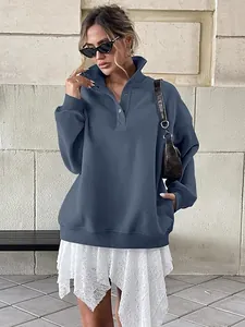 Oversized blue Henley sweatshirt for women with button-down collar and lace skirt detail