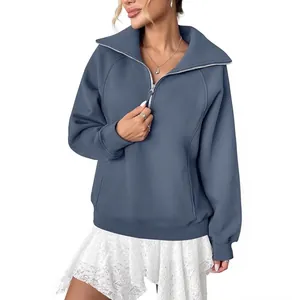 Felpa in pile da donna vestibilità comoda con mezza zip e tasca frontale in blu elegante