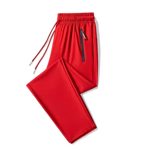 Vibrant red quick-dry ice silk sports pants for men, lightweight summer running trousers