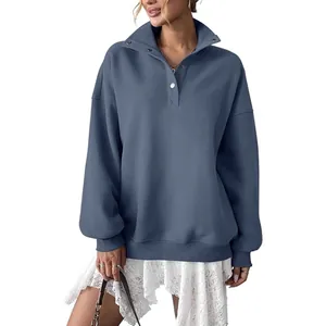 Women's oversized dusty blue fleece-lined sweatshirt with a buttoned polo collar