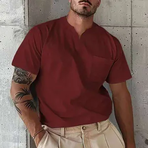 Detail view of men's maroon V-neck T-shirt with chest pocket design.