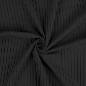 Close-up of black ribbed fabric showing high-elasticity texture for men's polo shirt
