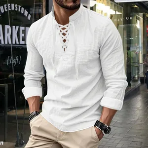 Close-up of men's white cotton linen Henley shirt featuring lace-up collar detail.