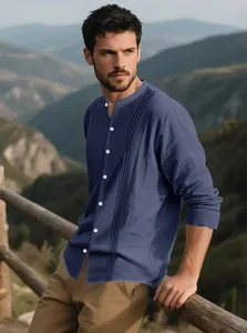 Men's navy blue linen cotton shirt with mandarin collar and button details in outdoor setting.