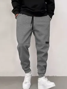Γκρι ανδρικό παντελόνι jogger high street style με ελαστικές μανσέτες και κορδόνι