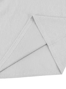Detailed macro shot showing light grey ribbed corduroy fabric texture and hem stitching