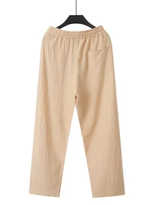 Vue arrière détaillée du pantalon décontracté en lin beige pour homme avec taille élastique