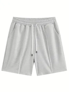 Dettaglio ad alta definizione del tessuto con trama a nido d'ape grigio chiaro degli shorts