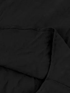 Close-up texture view showing the high-quality black cotton linen fabric and stitching