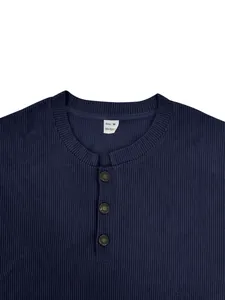 Detail view of a navy blue ribbed henley shirt with buttoned neckline and size tag