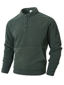 Detailed view of the dark green men's fleece pullover with standing collar and buttons.