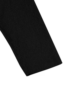 Close-up detail of black corduroy fabric texture on a men's sweatshirt sleeve cuff