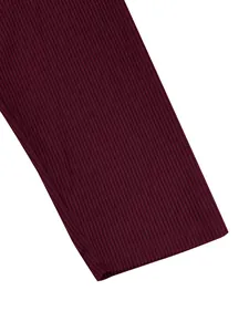 Detailed close-up of the burgundy ribbed corduroy sleeve on a men's fashion sweatshirt