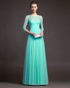 Elegantes langärmeliges türkisfarbenes Spitzen-Abendkleid mit Tüllrock und Details.