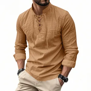 Detail view of camel cotton linen Henry shirt with lace-up collar and rolled sleeves