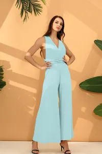 Elegant light blue multiway bandage jumpsuit with wide legs for a chic summer holiday look.