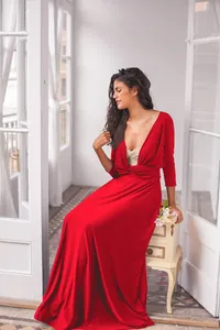 Detail of red multiway infinity maxi dress with three-quarter sleeves and wrap design