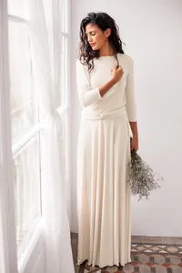 Elegant cream white maxi dress with three-quarter sleeves and twist waist detail