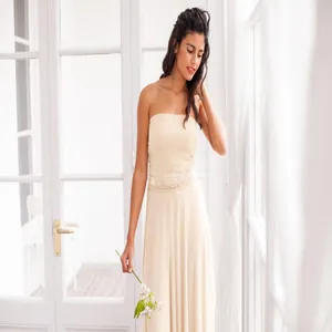 Elegant cream strapless multi-way maxi dress with embellished waist for formal events