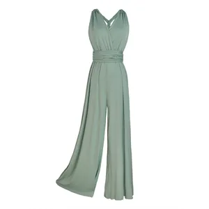 Close-up of sage green multi-way wrap wide-leg jumpsuit with cross-back detail