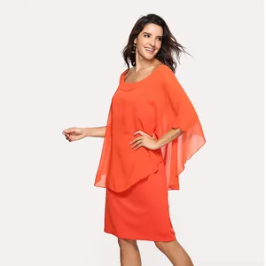 Detailed view of an orange faux two-piece chiffon dress with flowing cape sleeves
