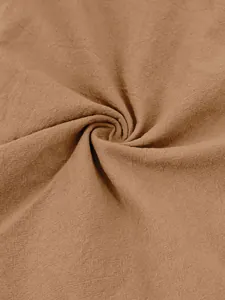 Macro detail of breathable camel cotton-linen fabric texture for men's shirt