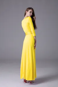 Back view of elegant yellow multi-way maxi dress with 3/4 sleeves and floor length