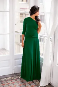 Elegant emerald green multi-way maxi dress with three-quarter sleeves and twist waist.