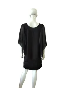 Back view detail of elegant black plus size dress featuring sheer chiffon capelet overlay