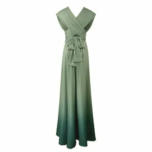 Back view of a sage green gradient multi-way infinity dress with cross-back tie design