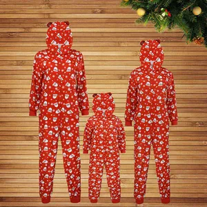 Detailed set of red matching family Christmas hooded onesies with festive Santa prints