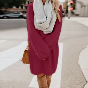 Detail showing texture of a burgundy fuzzy long sleeve crew neck loose sweater dress