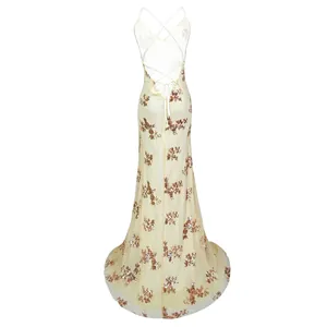 Back view of elegant backless evening gown with rose gold sequins and cross straps