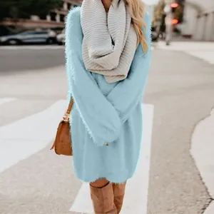 Stylish light blue fuzzy long sleeve sweater dress shown in a cozy outdoor autumn setting