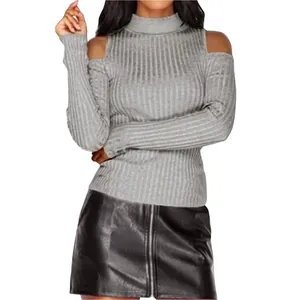 Close-up of a women's grey cold shoulder turtleneck knit sweater with ribbed texture