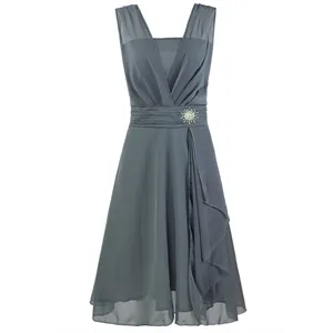 Elegant slate grey V-neck bridesmaid dress with waist brooch and ruffled hem details