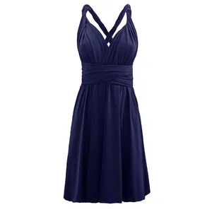 Detailed front view of a navy blue multi-way wrap dress with sexy cross-back straps